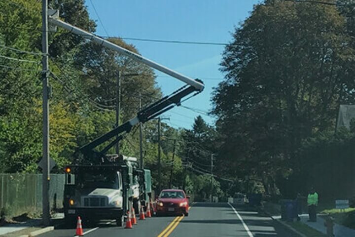 Tree Tech service truck parked on the side of the road to assist with road side clearing